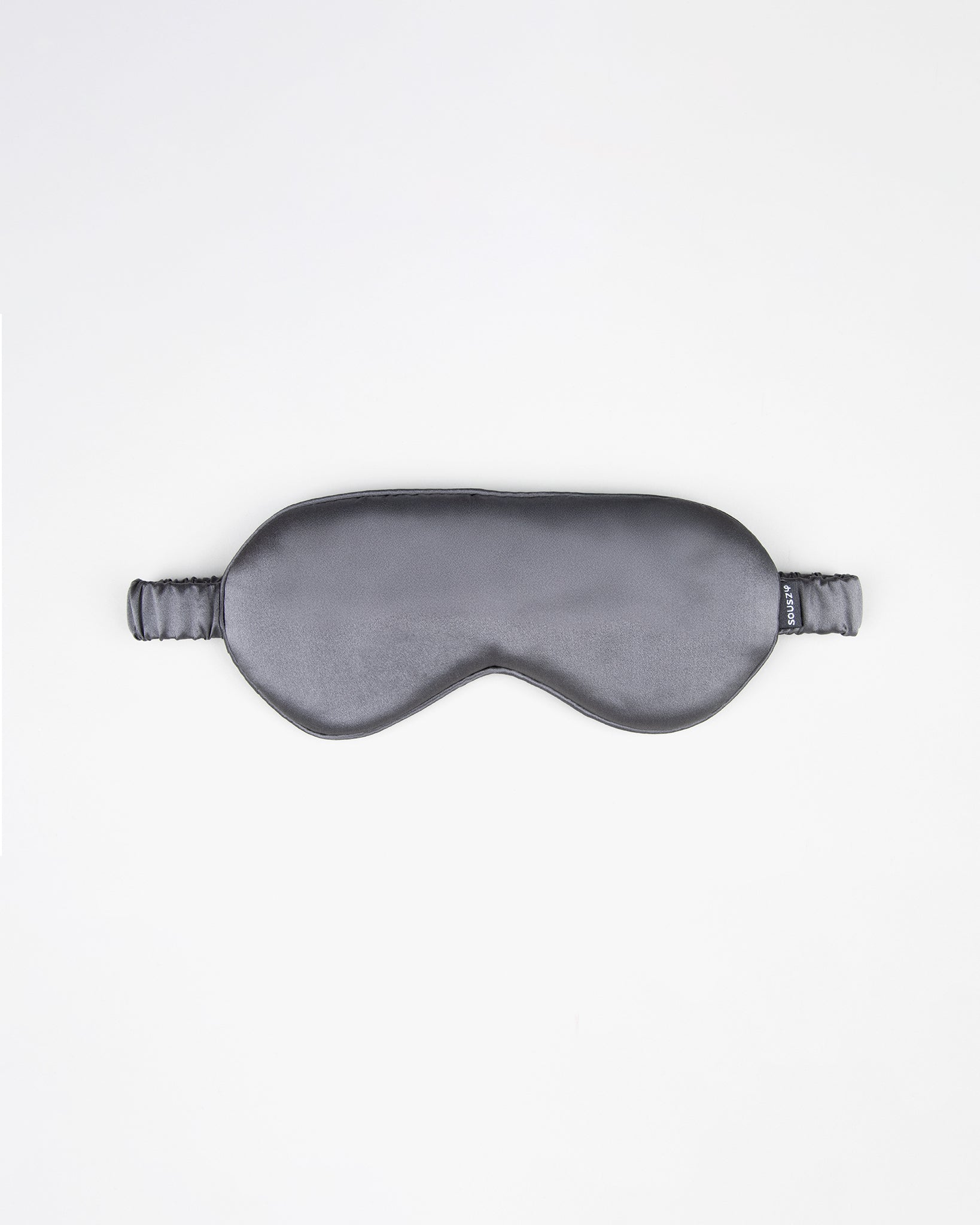 Gray silk sleep mask on a white background