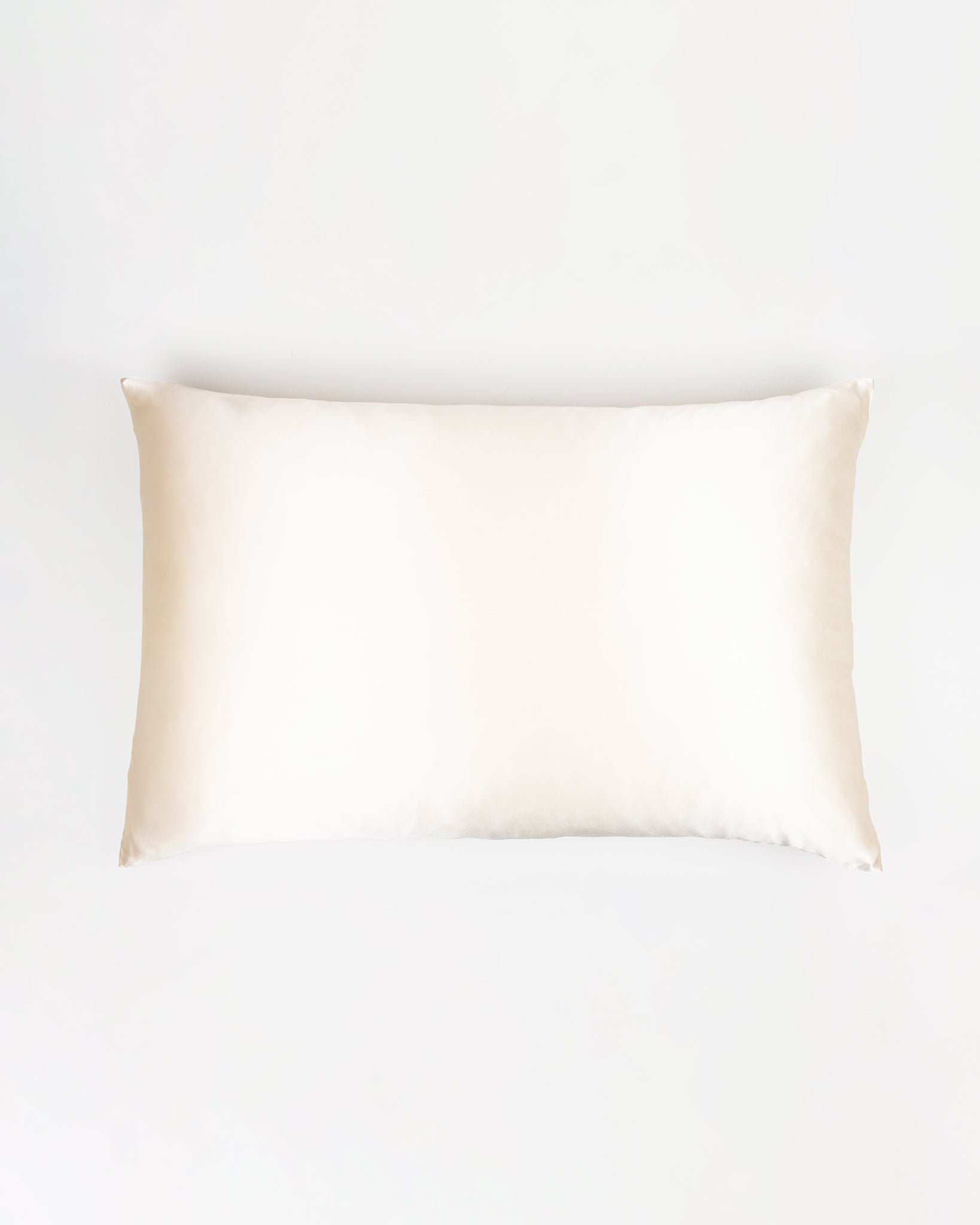 Beige pillowcase on a white background